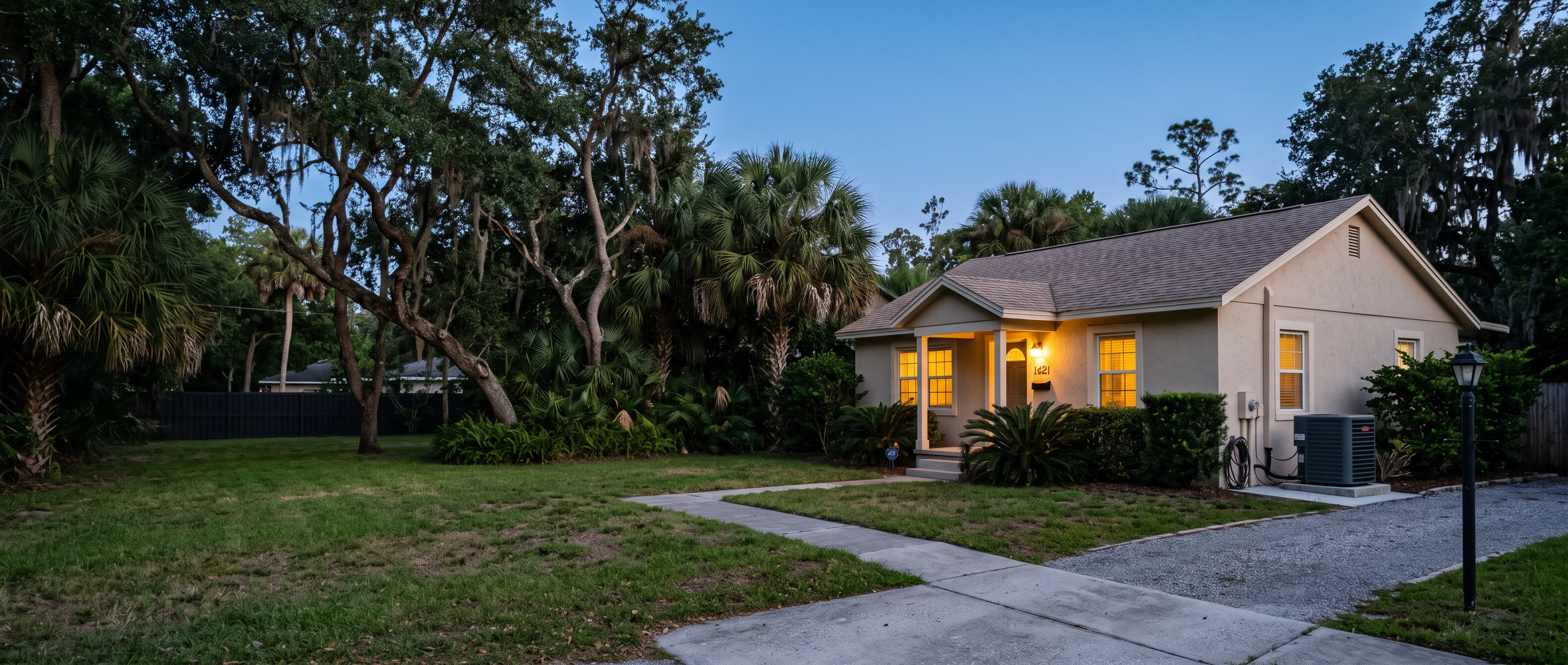 Jacksonville home on a cold clear evening with warm light in the windows